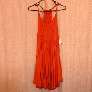 Bright orange dress with diamond embroidery